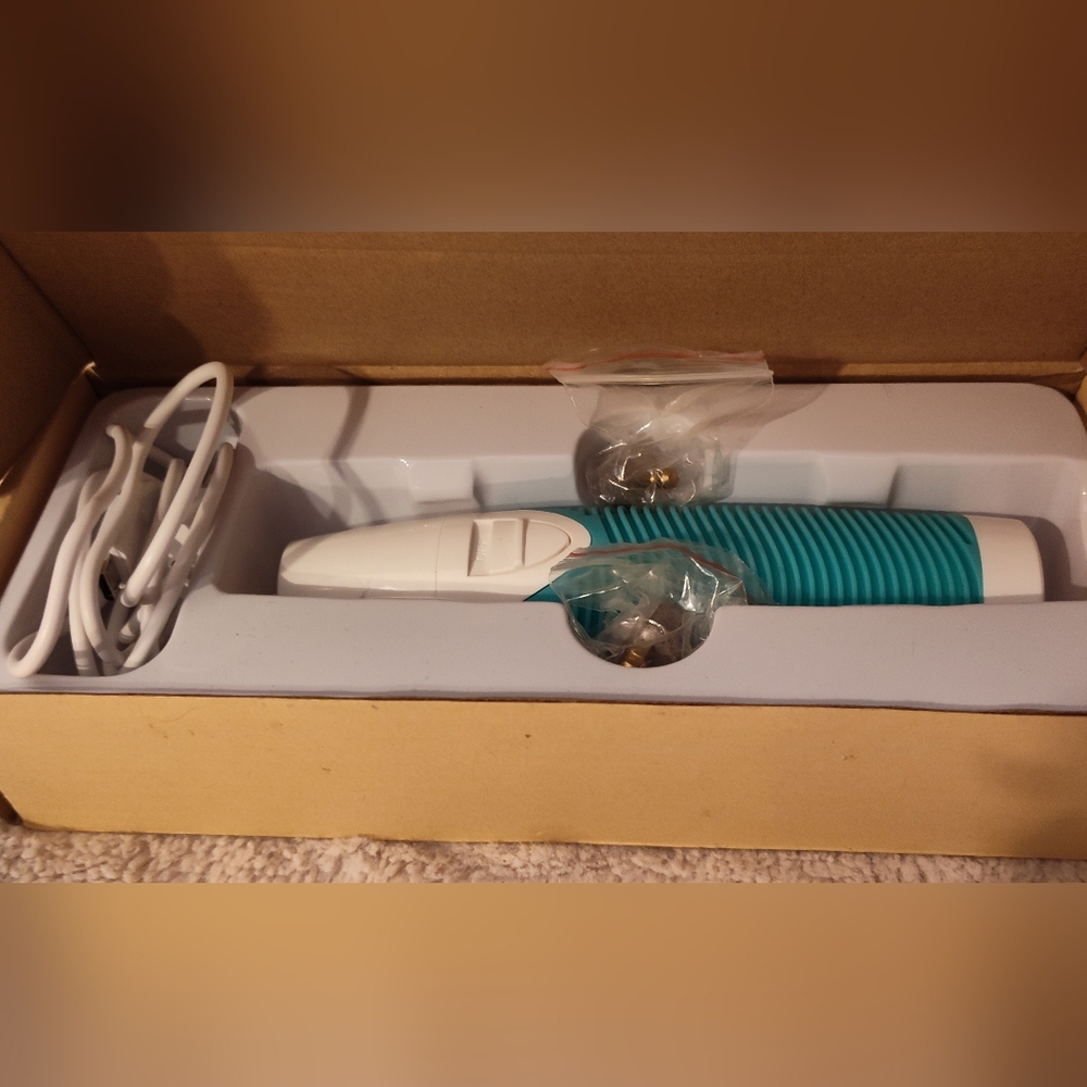 White and Teal Hair Clipper